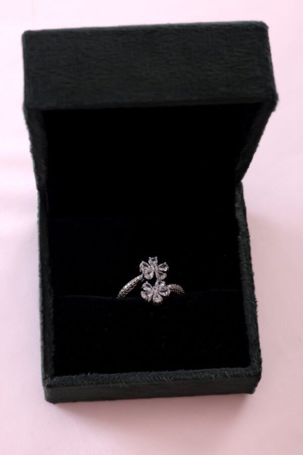 Exquisite Silver Floral Ring with Sparkling Petal-Shaped Gemstones – A Dazzling Symbol of Elegance and Grace - Image 2