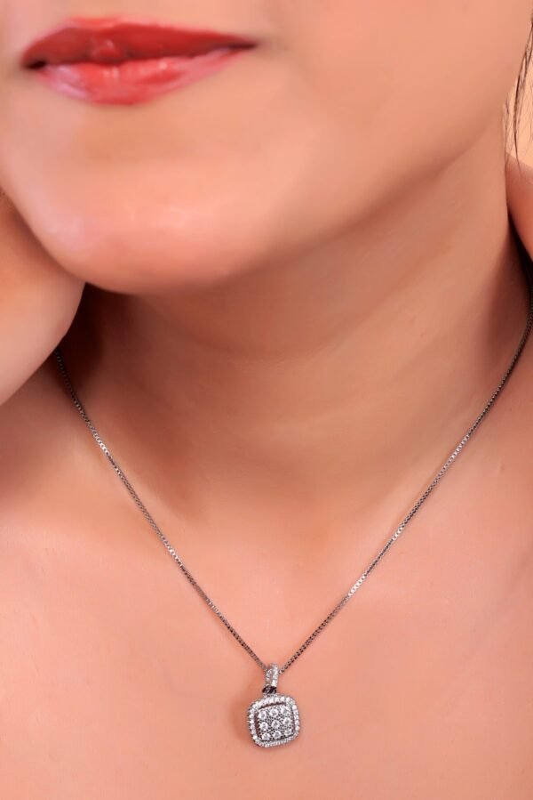 Elegant Diamond Pendant Necklace on Black Textured Background - Image 5