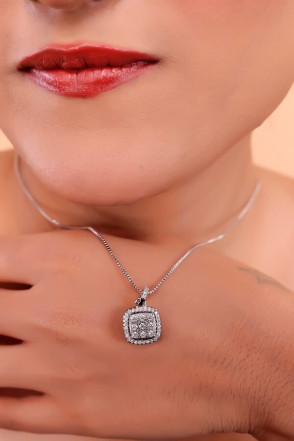 Elegant Diamond Pendant Necklace on Black Textured Background - Image 2