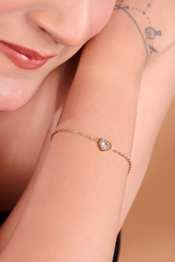 Elegant Gold Heart Bracelet with Sparkling Crystal Accent – A Symbol of Love & Grace - Image 6